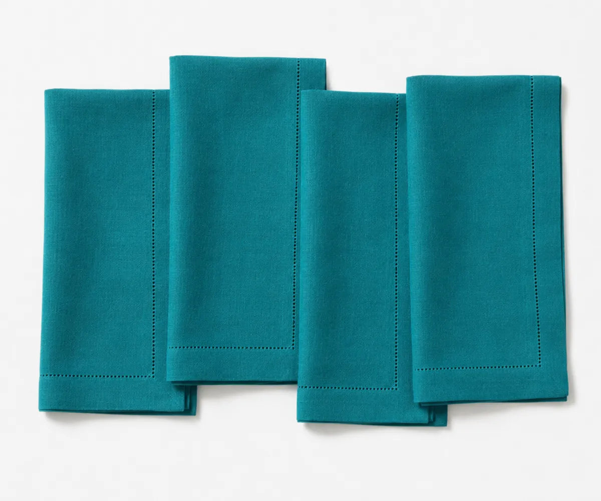 Soft prewashed linen napkins with timeless hemstitch design for upscale dining
