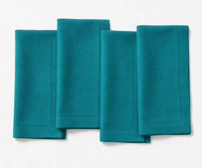 Soft prewashed linen napkins with timeless hemstitch design for upscale dining
