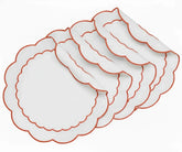 Terracotta embroidered scalloped edge placemats made from 100% cotton, round white placemats for warm, earthy, and elegant table settings.