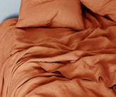 linen bedding set with earthy-toned linen bed sheets king size and duvet cover, perfect for warm and cozy bedroom décor.