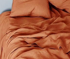 linen bedding set with earthy-toned linen bed sheets king size and duvet cover, perfect for warm and cozy bedroom décor.