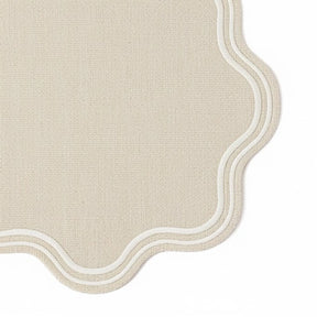 natural round placemat with scalloped trim – eco-friendly cotton table décor for rustic and modern tables.