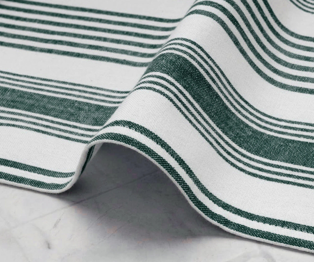 Close-up of green striped cotton cloth napkin fabric