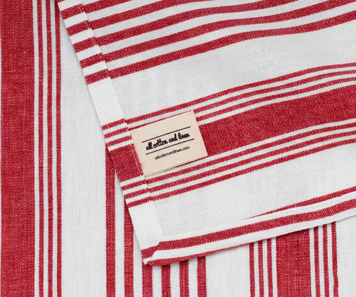 Red striped cotton napkins with Our Brand Logo