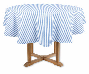 Blue and white striped tablecloth on a wooden table