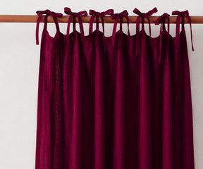 Burgundy tie top linen drapes made from premium flax linen, rustic window curtains for dining rooms, cozy bedrooms, and traditional interiors.