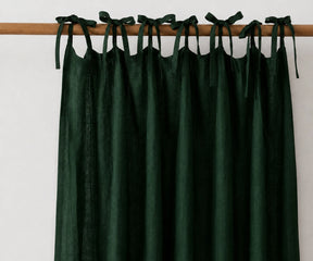 Forest green tie top linen curtain panels made from 100% flax linen, light filtering curtains for farmhouse and Scandinavian homes.