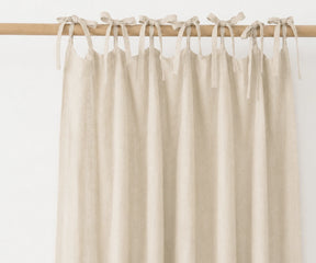 Natural  linen curtain panels with tie top finish, eco-friendly light filtering drapes for timeless home décor.