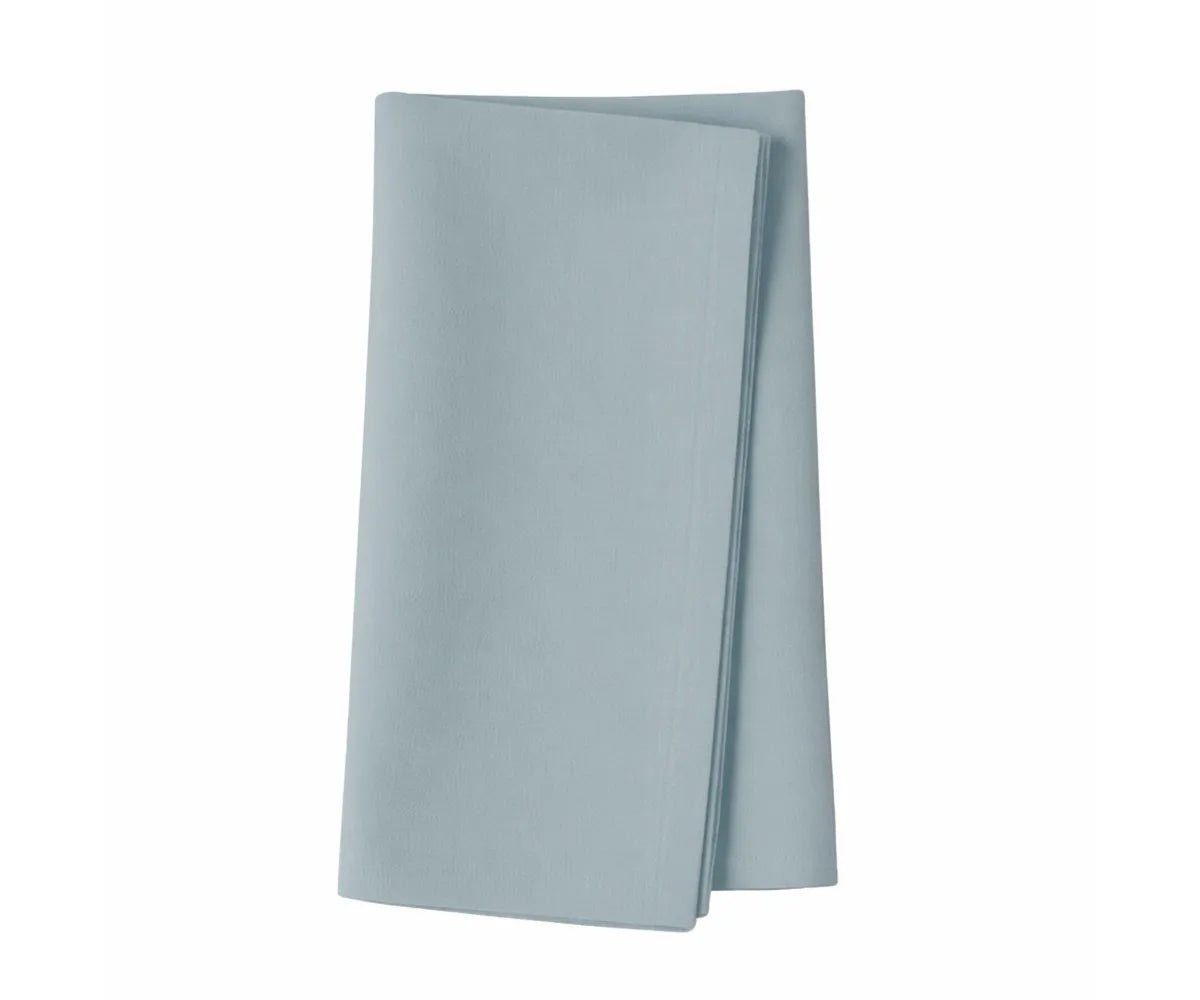 Elegant plain tourmaline napkins for sophisticated dining table settings.
