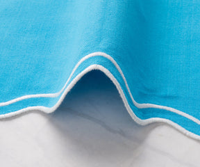 Eco-friendly turquoise cotton dinner napkins with scalloped edges, durable cloth napkins in sets of 12 and 24 for home or restaurant use