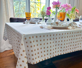 Elegant wedding tablecloth with metallic accents.