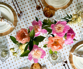 White tablecloth with metallic pattern, wedding-ready.