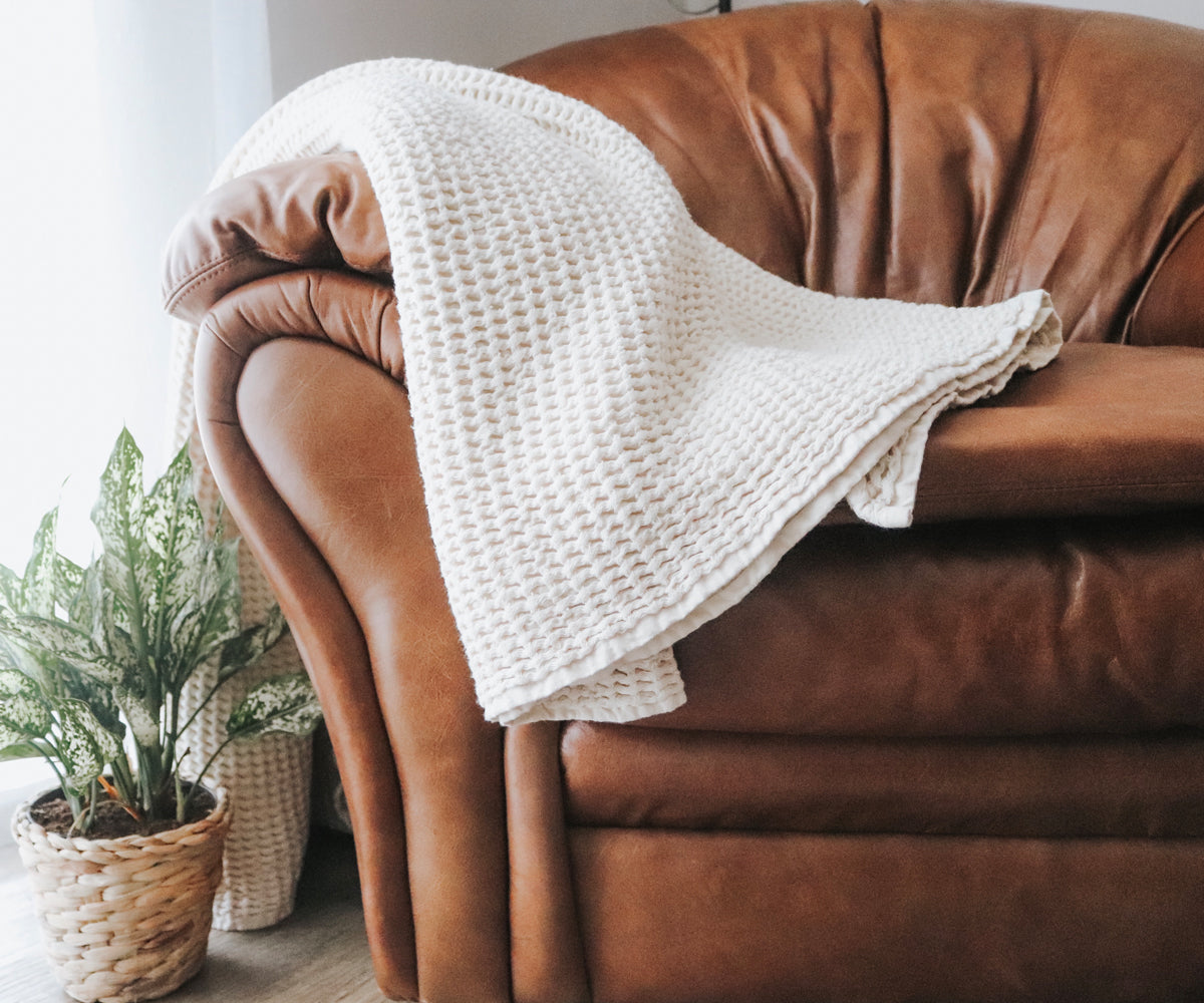 All-season waffle weave blanket made from natural cotton for comfortable sleep