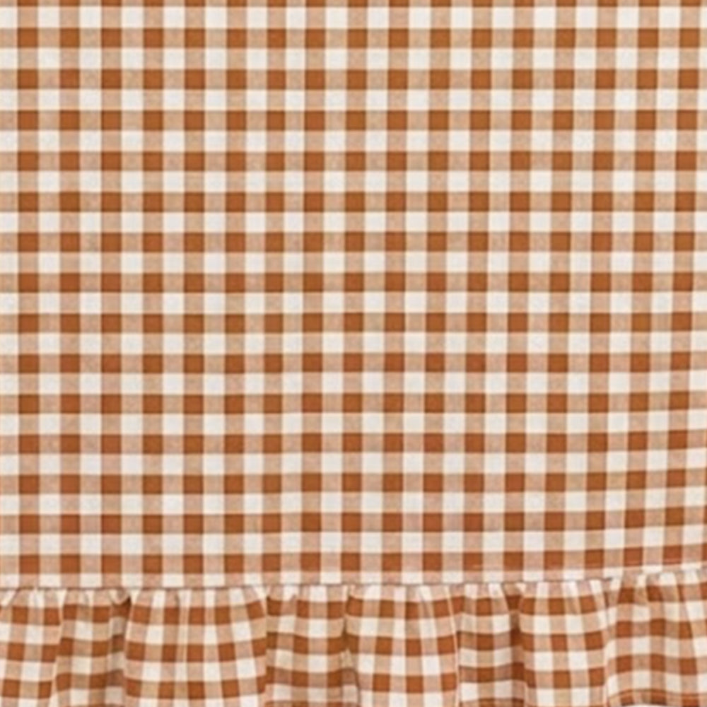Tablecloth fabric sample highlighting breathable cotton weave and timeless gingham design