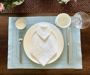 Premium white cotton cloth napkins, reusable and eco-friendly hemstitched dinner napkins for weddings, family meals, and events