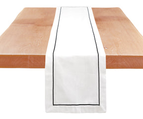 Stylish line embroidery details on this cotton table runner.