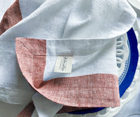 You can choose from a variety of cloth dinner napkins, including white and red options. These cloth napkins add a touch of elegance to your dining experience.