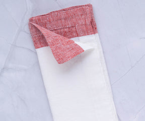 There are cloth dinner napkins available, including white and red cloth napkins. Consider using cloth dinner napkins for an elegant touch to your dining experience.