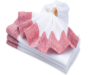 Assorted linens napkins adding color to the dining setup.