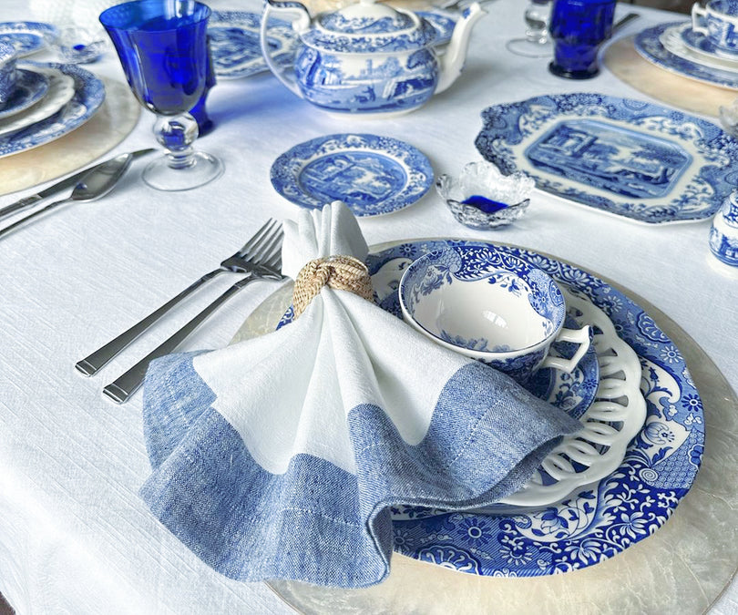 High-quality white napkins on a rustic table setting for a dinner party