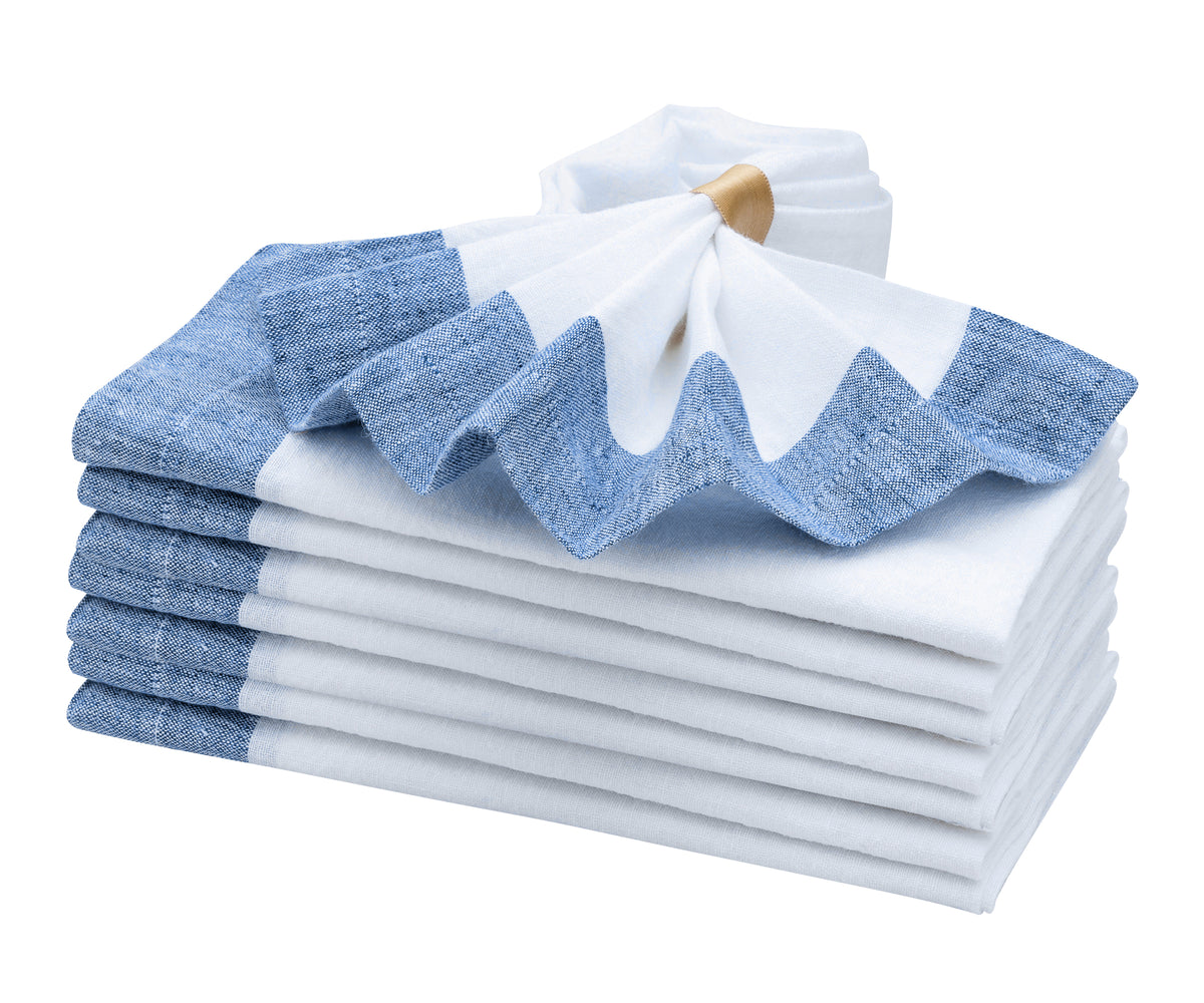 Crisp white linen napkins for a timeless tablescape.