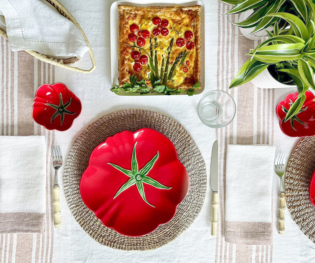 Red linen napkins featured in a rustic-style kitchen scene.