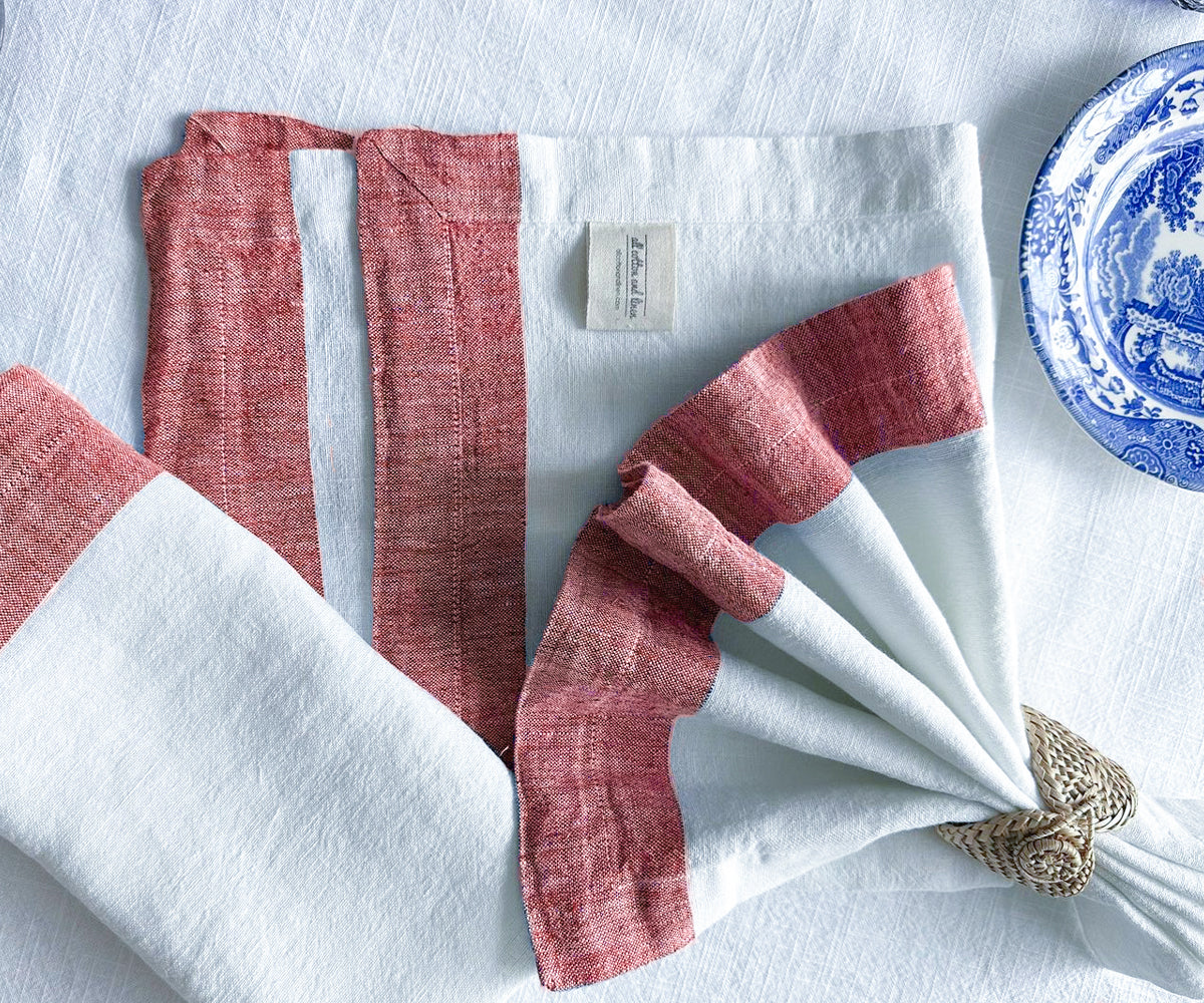 Cloth dinner napkins are available in various colors, including white, red, and other options. Choose from a range of cloth dinner napkins to suit your table setting.