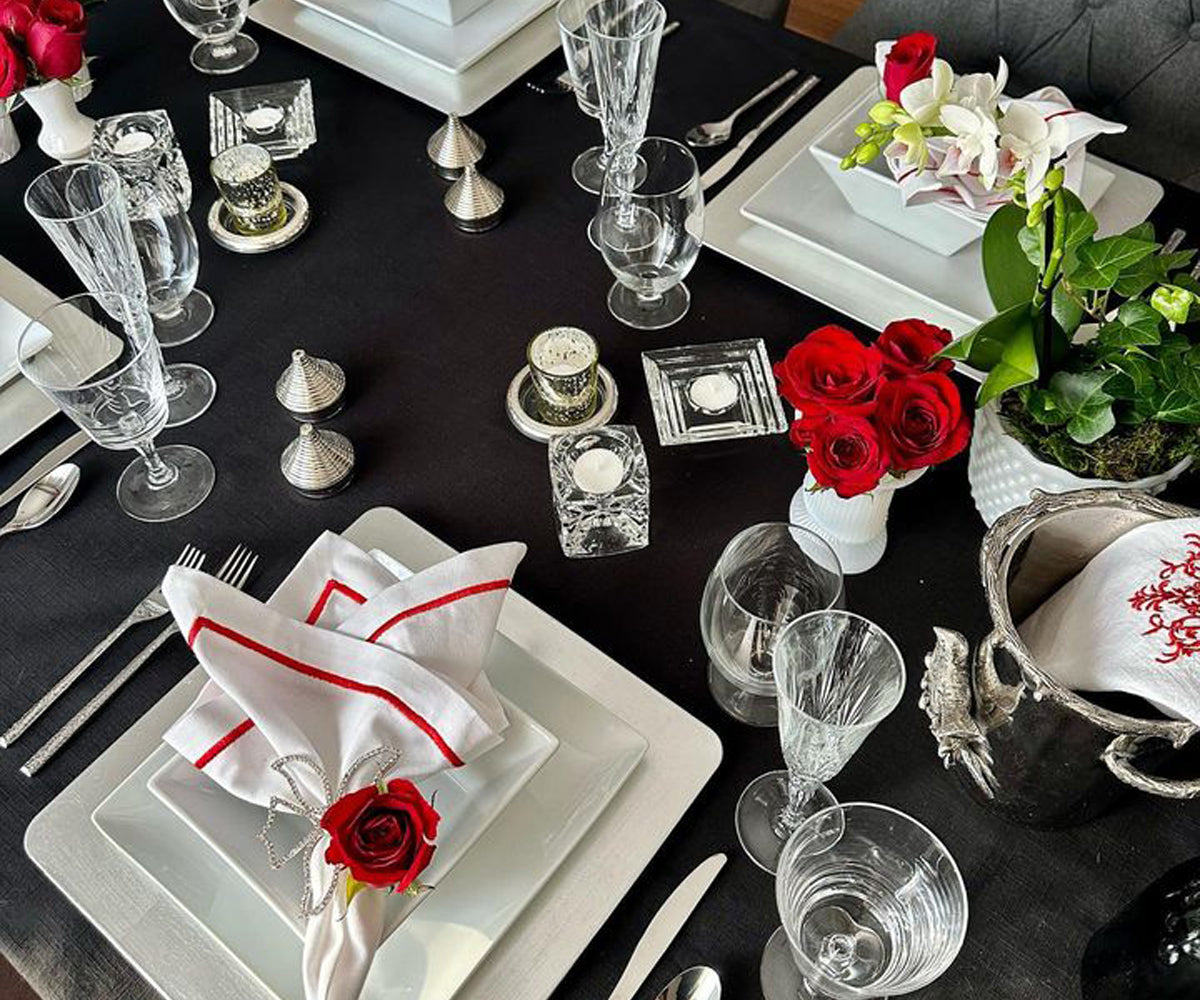 Set your table with soft red and white napkins, adding a natural touch.
