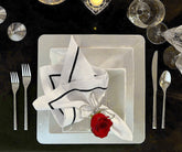 Bulk linen napkins neatly folded and ready for a special event.
