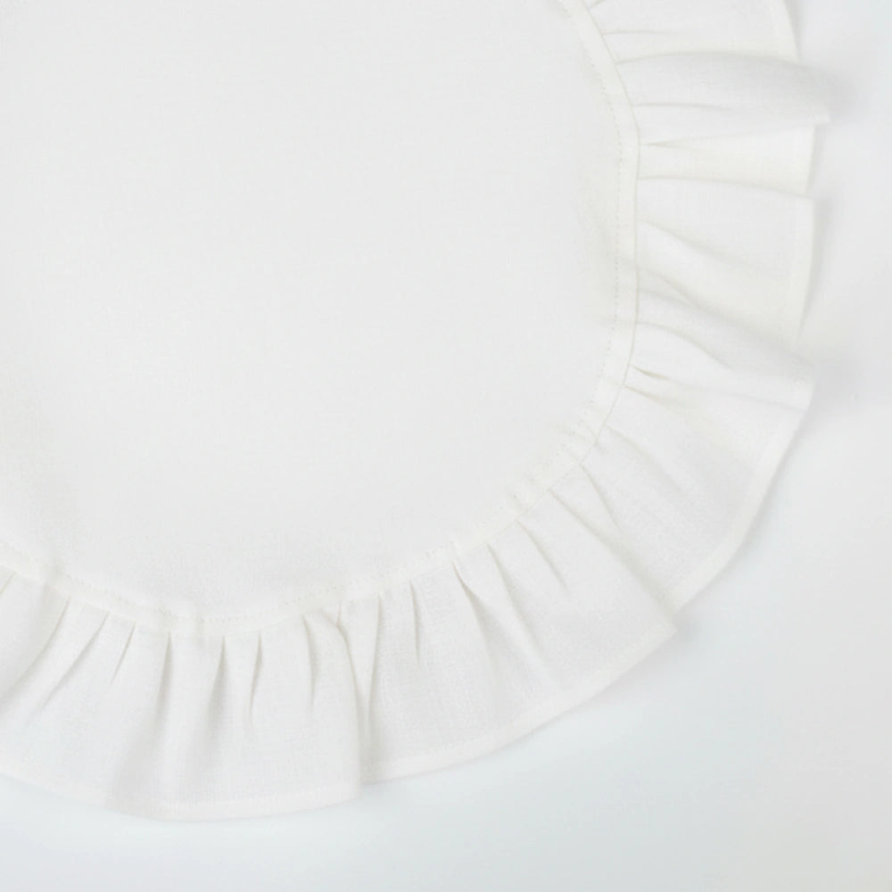 Crisp white ruffle edge cotton napkins designed for weddings, dinner parties, and timeless table décor.