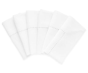 linen hemstitch napkins are adding a touch of refinement and sophistication to the overall design.