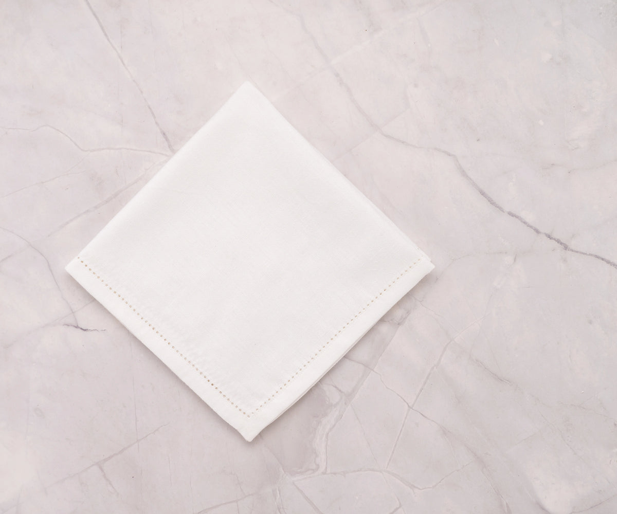 hemstitch border on white cotton-linen napkin