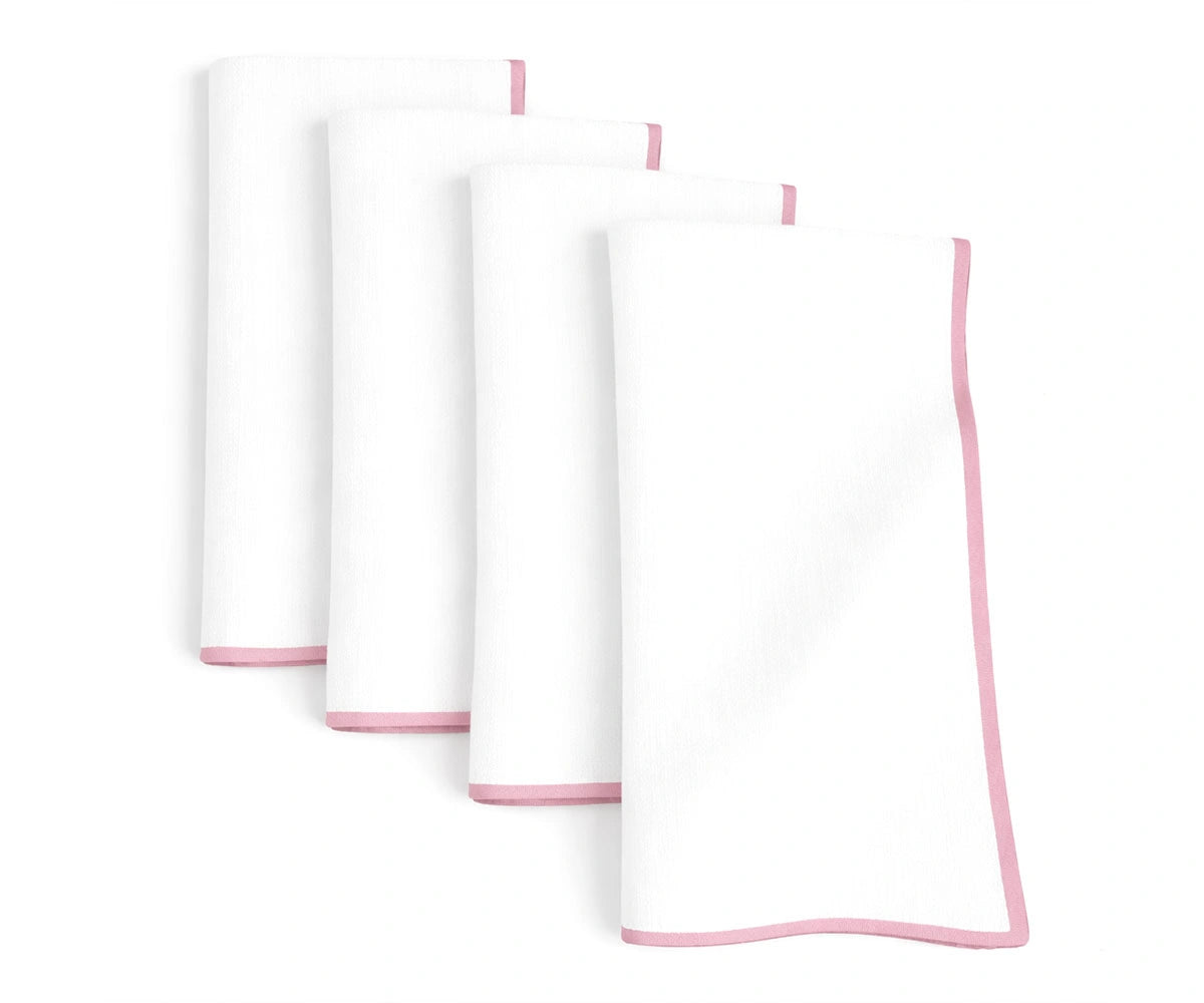 White cotton napkins with pastel pink merrow stitch edge, soft embroidered napkins for elegant entertaining