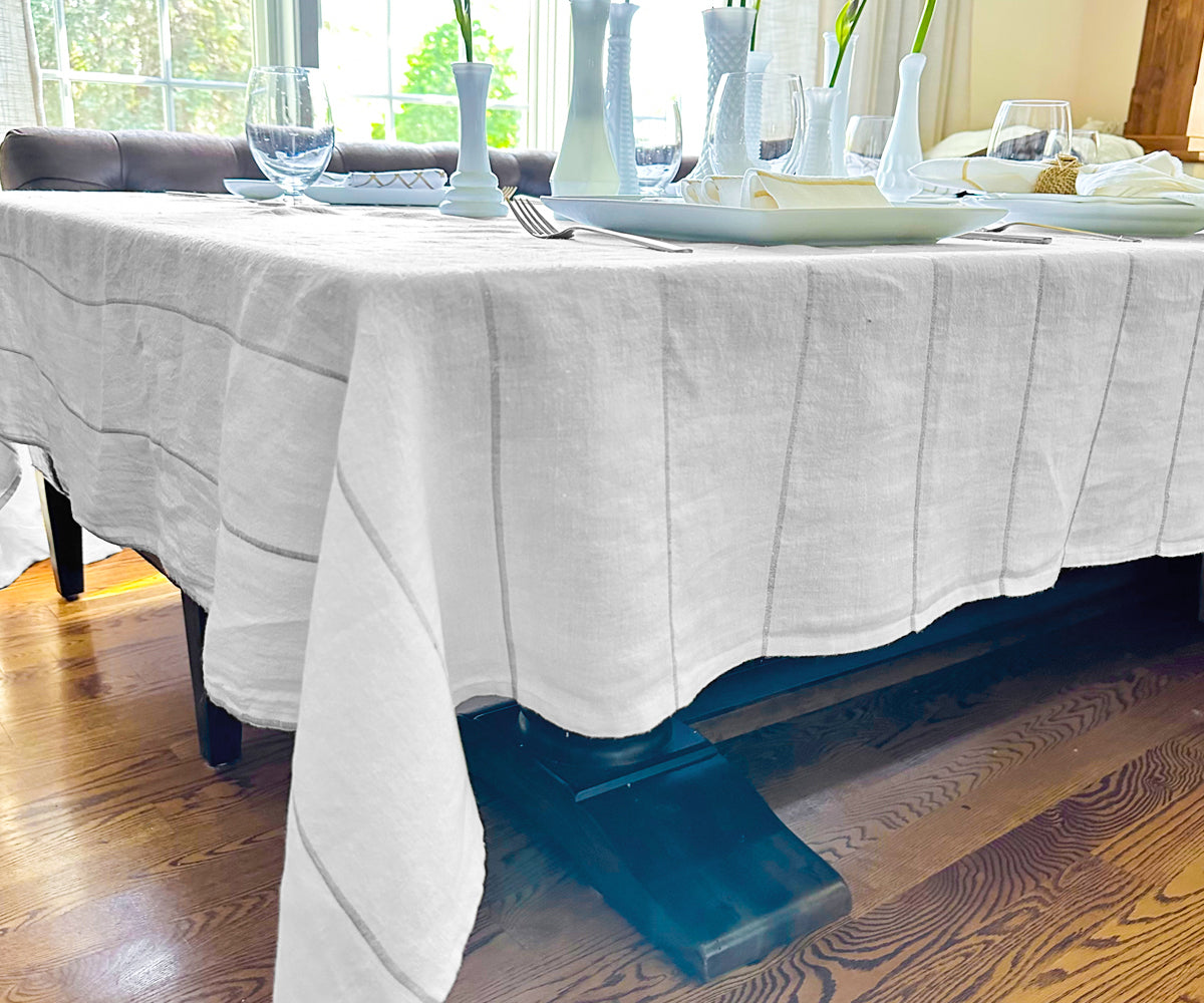 Enhance your dining area with silver & printed tablecloths, infusing a touch of luxury and elegance into your space.