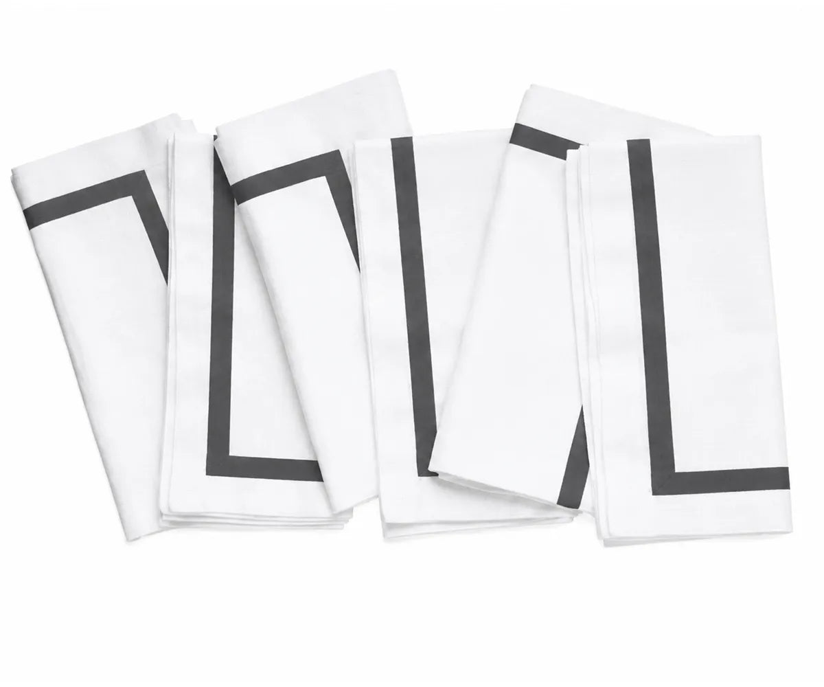 100% cotton white table napkin folded neatly for a beautiful place setting at dinners, celebrations, or gatherings.