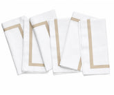 Set of soft 100% cotton cloth napkins in white, designed for reusable everyday dining and entertaining.