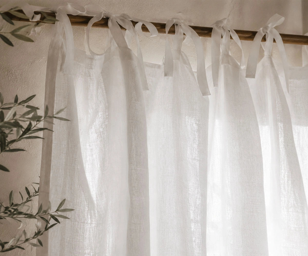 White Tie Top Linen Curtain Panels in breathable European flax linen for timeless elegance. Semi sheer linen curtains that softly filter sunlight while providing everyday privacy.