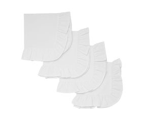 White cotton ruffle edge dinner napkins neatly folded on a table