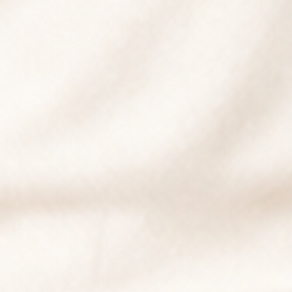 Fabric swatch showing cream ribbed cotton material