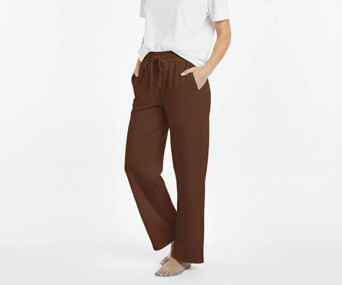 Women’s relaxed-fit brown pants for women made from soft, breathable fabric for casual and travel wear.