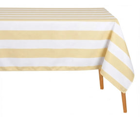 Butter Yellow and white wide cabana striped cotton linen tablecloth with straight edges draped over a dining table.