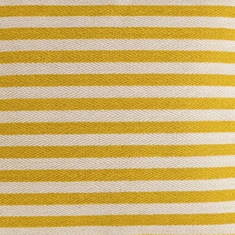 Close-up texture of  yellow and beige striped fabric featuring a prominent herringbone jacquard weave and horizontal stripes