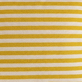 Close-up texture of  yellow and beige striped fabric featuring a prominent herringbone jacquard weave and horizontal stripes