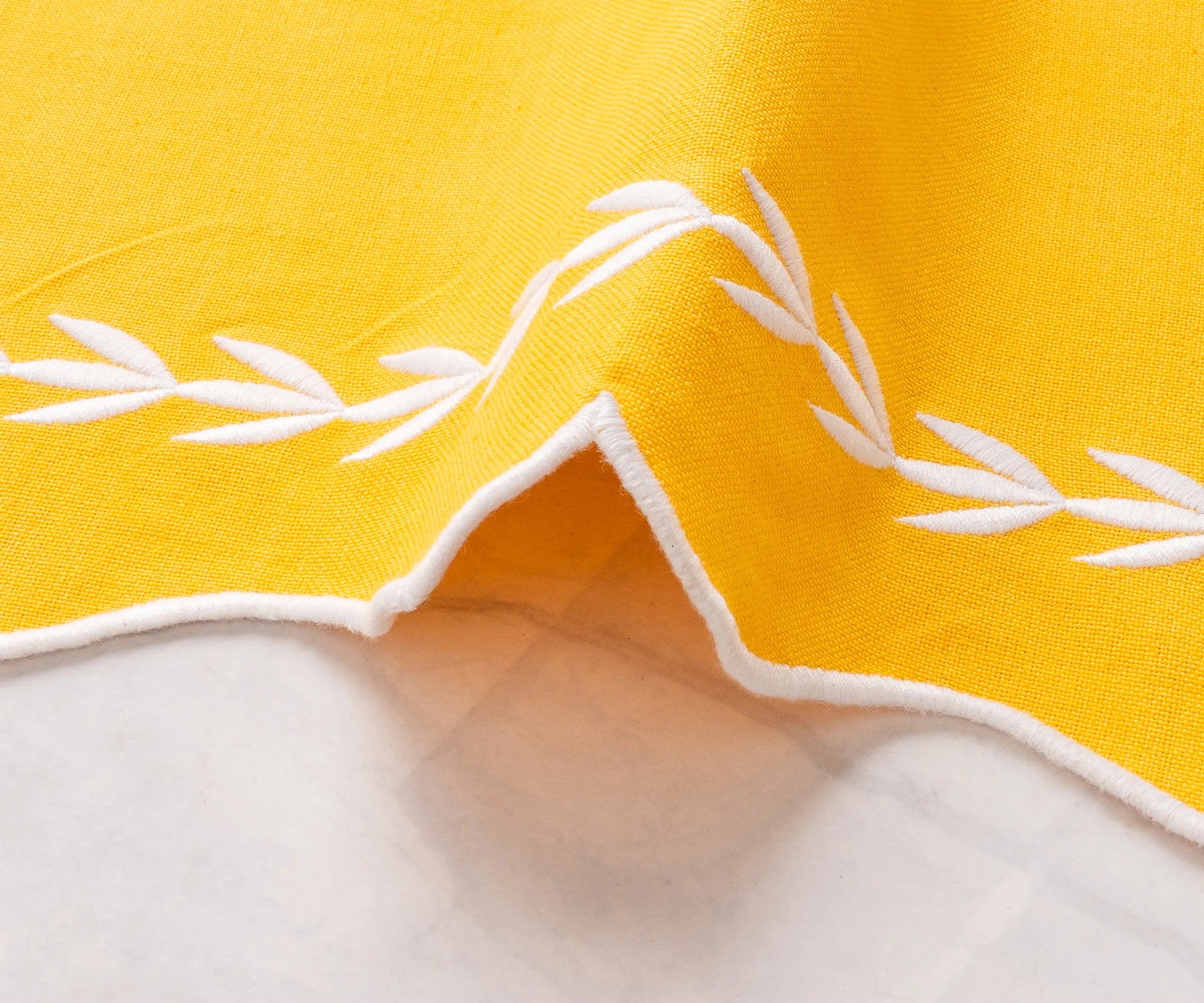 Eco-friendly yellow cotton dinner napkins with scalloped edges, durable cloth napkins in sets of 12 and 24 for home, restaurants, or events