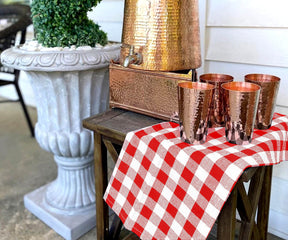 A set of red and white towels is a great way to add a touch of Christmas cheer to your kitchen and make your holiday meals a little more festive.