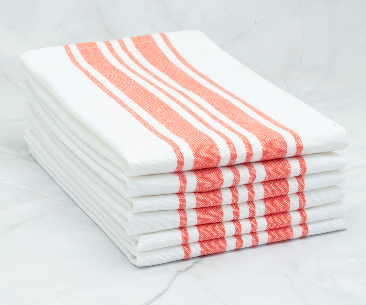 Stack of white and red striped restaurant napkins