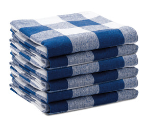 Blue kitchen towels folded and displayed on.