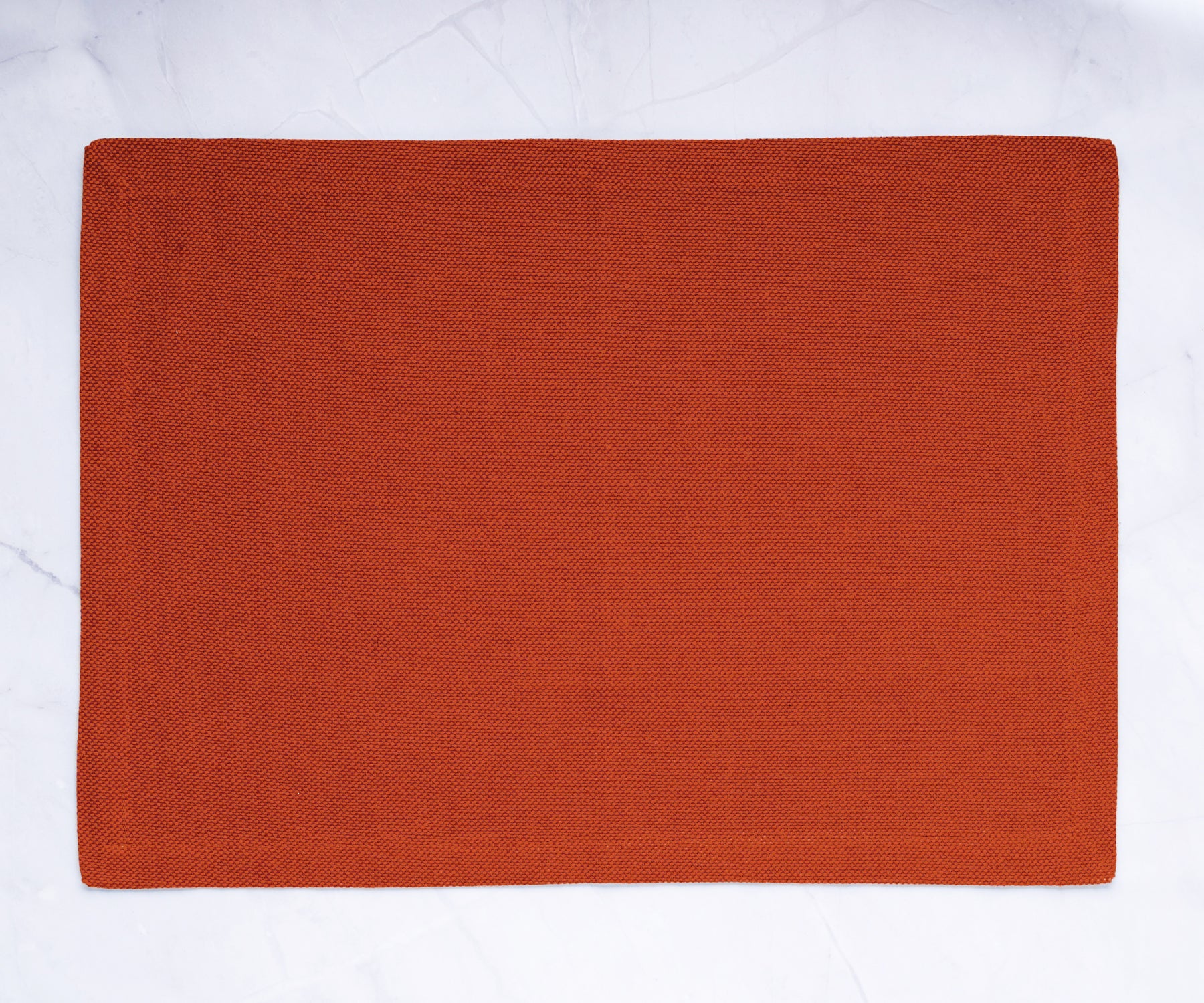 Red fabric placemats: Elevate your dining setup with style and protection, ensuring an elegant and practical experience.