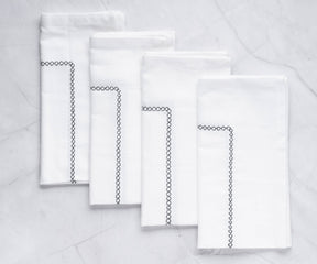 cotton napkins with embroidery or dinner napkins are cotton fabric. embroidered black napkins are square napkins.