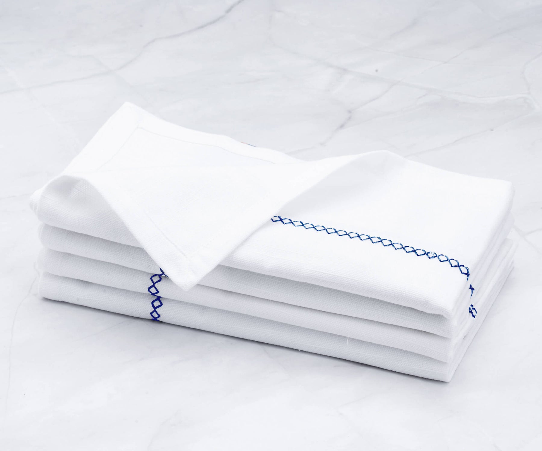 Many embroidery white napkins can be personalized with custom designs